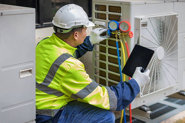 Professional Heat Pump Repair technician working in Forest City, NC